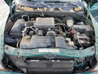 2003 Dodge Durango SLT Plus z VIN 1D4HS58N13F538012, wystawiony jako Copart lot #84553654 z przebiegiem 179 370 mil mil oraz Szkoda całkowita • Salvage title. Historia ofert i sprzedaży dostępna na DreamBid. Obrazek 13.