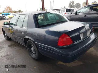 2001 Ford Crown Victoria Police Police Interceptor with VIN 2FAFP71WX1X127347, listed as a IAAI auction lot 41134745 with 161,180 mi miles. Bid and sale history available at carsss.com. Image 3.