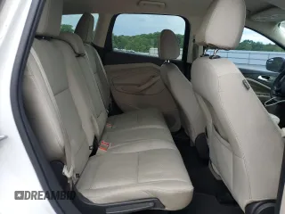 2017 Ford Escape SE z VIN 1FMCU0G99HUA75866, wystawiony jako Copart lot #57274785 z przebiegiem 132 874 mil mil oraz Czysty tytuł • Clean title. Historia ofert i sprzedaży dostępna na DreamBid. Obrazek 11.