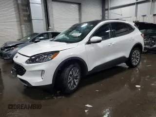 2020 Ford Escape Titanium Hybrid z VIN 1FMCU9DZ0LUC56078, wystawiony jako Copart lot #56062635 z przebiegiem 55 202 mil mil oraz Szkody całkowita. Historia ofert i sprzedaży dostępna na DreamBid. Obrazek 1.