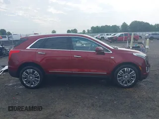 2018 Cadillac XT5 Premium Luxury FWD z VIN 1GYKNERS2JZ242842, wystawiony jako IAAI lot #42297159 z przebiegiem 72 008 mil mil oraz . Historia ofert i sprzedaży dostępna na DreamBid. Obrazek 13.