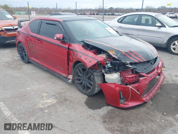 2016 Scion tC with VIN JTKJF5C74GJ026588, listed as a IAAI auction lot 41582253 with 74,023 mi miles. Bid and sale history available at carsss.com. Image 1.