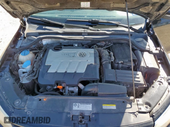 2013 Volkswagen Jetta TDI w/Premium z VIN 3VWLL7AJ7DM232096, wystawiony jako Copart lot #57265725 z przebiegiem 120 361 mil mil oraz Szkoda całkowita • Salvage title. Historia ofert i sprzedaży dostępna na DreamBid. Obrazek 11.
