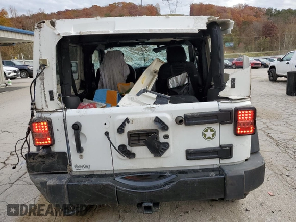 2017 Jeep Wrangler Willys Wheeler with VIN 1C4AJWAG7HL589574, listed as a Copart auction lot 79006504 with 117,075 mi miles and Salvage Title. Bid and sale history available at DreamBid. Image 6.
