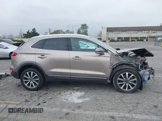 2019 Lincoln MKC Reserve with VIN 5LMCJ3C9XKUL09386, listed as a IAAI auction lot 41857681 with 66,101 mi miles and . Bid and sale history available at DreamBid. Image 14.