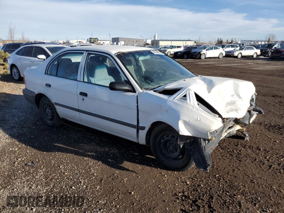 1998 Toyota Tercel z VIN JT2BC53LXW0335979, wystawiony jako Copart lot #46542655 z przebiegiem 275 340 mil mil oraz Nie do naprawy • Non repairable. Historia ofert i sprzedaży dostępna na DreamBid. Obrazek 4.