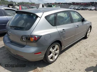 2005 Mazda 3 s with VIN JM1BK343151259901, listed as a IAAI auction lot 42028513 with 209,689 mi miles. Bid and sale history available at carsss.com. Image 4.