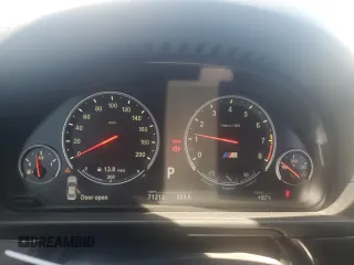 2014 BMW M5 z VIN WBSFV9C52ED593005, wystawiony jako Copart lot #49054395 z przebiegiem 71 213 mil mil oraz Szkoda całkowita • Salvage title. Historia ofert i sprzedaży dostępna na DreamBid. Obrazek 9.