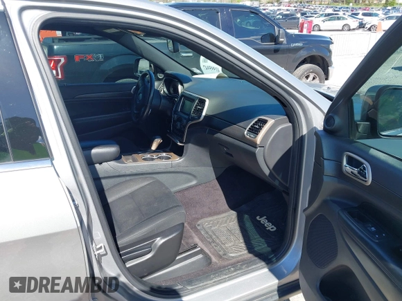 2016 Jeep Grand Cherokee Laredo z VIN 1C4RJFAG0GC384227, wystawiony jako IAAI lot #41995947 z przebiegiem 155 276 mil mil oraz . Historia ofert i sprzedaży dostępna na DreamBid. Obrazek 5.