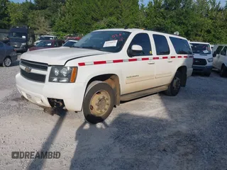 2011 Chevrolet Suburban LS with VIN 1GNWKLEG2BR376507, listed as a IAAI auction lot 42590824 with 213,035 mi miles and . Bid and sale history available at DreamBid. Image 17.