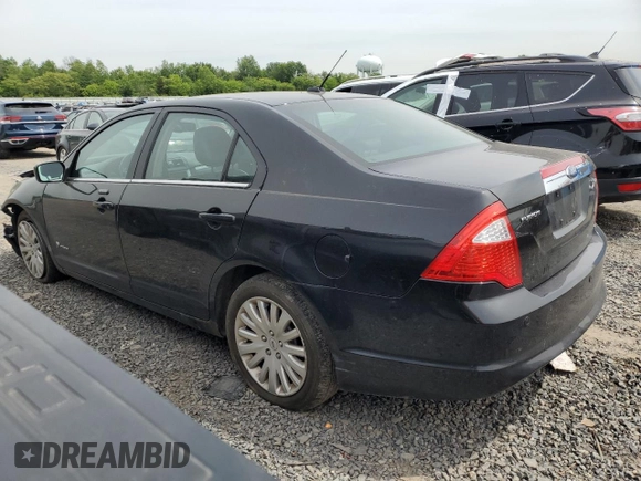 2010 Ford Fusion Hybrid с VIN 3FADP0L34AR129353, выставлен на аукционе Copart как лот 58310725 с пробегом 237 662 миль миль и Списание • Salvage title. История ставок и продаж доступна на DreamBid. Изображение 2.