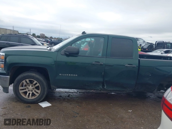 2014 Chevrolet Silverado 1500 LT with VIN 1GCRCREH7EZ340962, listed as a IAAI auction lot 41470994 with 179,326 mi miles and . Bid and sale history available at DreamBid. Image 14.