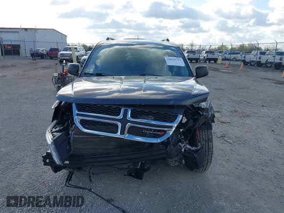 2017 Dodge Journey SE with VIN 3C4PDCAB0HT701477, listed as a IAAI auction lot 42025733 with 168,269 mi miles and . Bid and sale history available at DreamBid. Image 12.