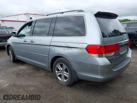2008 Honda Odyssey Touring with VIN 5FNRL38908B066127, listed as a IAAI auction lot 42219444 with 188,868 mi miles and . Bid and sale history available at DreamBid. Image 3.