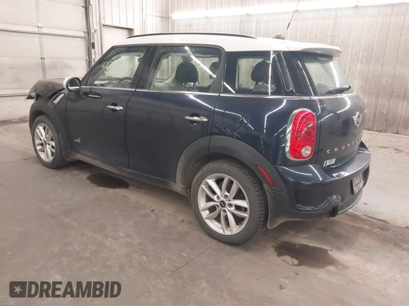 2014 MINI Countryman S with VIN WMWZC5C56EWP38017, listed as a IAAI auction lot 42287308 with 151,780 mi miles and . Bid and sale history available at DreamBid. Image 3.