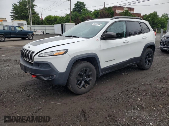 2015 Jeep Cherokee Trailhawk with VIN 1C4PJMBS6FW680963, listed as a Copart auction lot 61306385 with 174,793 mi miles and Clean title. Bid and sale history available at DreamBid. Image 1.