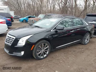 2013 Cadillac XTS Luxury with VIN 2G61R5S31D9221345, listed as a IAAI auction lot 41547095 with 148,070 mi miles. Bid and sale history available at carsss.com. Image 2.