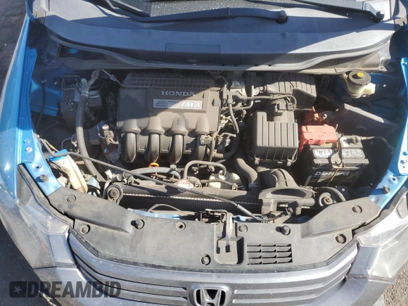 2011 Honda Insight LX z VIN JHMZE2H57BS004024, wystawiony jako Copart lot #54051775 z przebiegiem 161 198 mil mil oraz Szkoda całkowita • Salvage title. Historia ofert i sprzedaży dostępna na DreamBid. Obrazek 11.