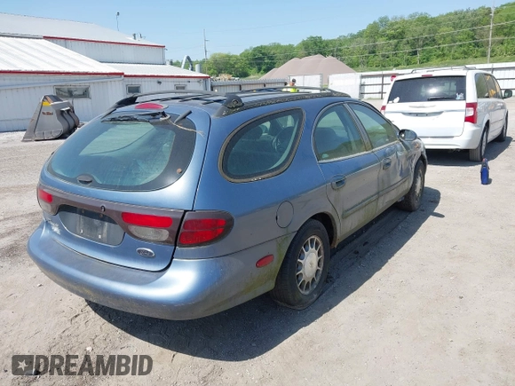 1999 Ford Taurus SE with VIN 1FAFP58SXXA242975, listed as a IAAI auction lot 42253538 with 228,824 mi miles and . Bid and sale history available at DreamBid. Image 4.