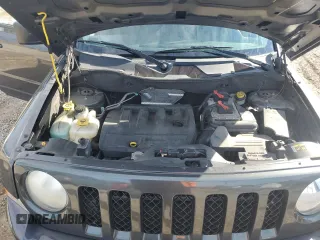 2015 Jeep Patriot Latitude with VIN 1C4NJPFBXFD281214, listed as a Copart auction lot 87883615 with 106,402 mi miles and Salvage Title. Bid and sale history available at DreamBid. Image 12.