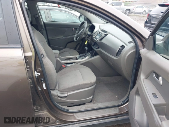 2011 Kia Sportage LX with VIN KNDPB3A20B7024111, listed as a IAAI auction lot 41945892 with 139,605 mi miles and . Bid and sale history available at carsss.com. Image 5.