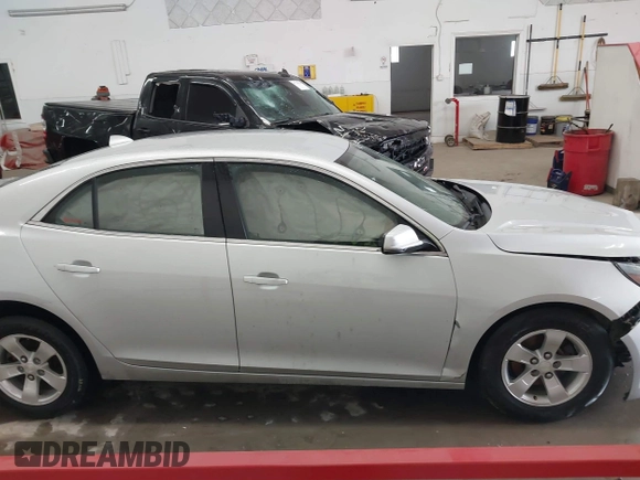 2014 Chevrolet Malibu LT with VIN 1G11C5SL2EF273583, listed as a IAAI auction lot 41721316 with 194,373 mi miles and . Bid and sale history available at DreamBid. Image 13.