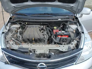 2012 Nissan Versa S with VIN 3N1BC1CP2CK272290, listed as a IAAI auction lot 42030626 with 136,000 mi miles. Bid and sale history available at carsss.com. Image 10.