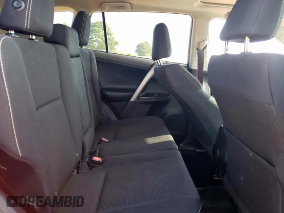 2018 Toyota RAV4 XLE with VIN 2T3RFREV7JW818661, listed as a Copart auction lot 65756615 with 56,369 mi miles and Salvage title. Bid and sale history available at DreamBid. Image 11.