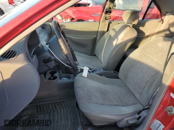 1998 Ford Escort LX z VIN 1FAFP10P2WW303270, wystawiony jako Copart lot #87588365 z przebiegiem 142 743 mil mil oraz Szkoda całkowita • Salvage title. Historia ofert i sprzedaży dostępna na DreamBid. Obrazek 7.