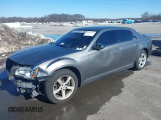 2011 Chrysler 300 with VIN 2C3CA6CTXBH563112, listed as a IAAI auction lot 41374372 with 151,947 mi miles. Bid and sale history available at carsss.com. Image 2.
