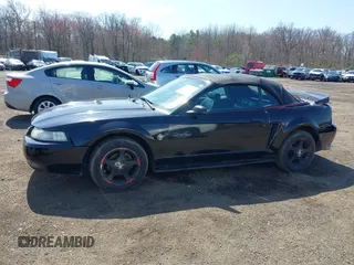 2000 Ford Mustang with VIN 1FAFP444XYF181018, listed as a IAAI auction lot 41943486 with 212,996 mi miles. Bid and sale history available at carsss.com. Image 14.
