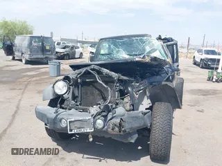 2011 Jeep Wrangler Unlimited Rubicon with VIN 1J4BA6H15BL580301, listed as a IAAI auction lot 42673014 with Not provided miles and . Bid and sale history available at DreamBid. Image 6.