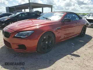 2017 BMW M6 z VIN WBS6G9C53HD932322, wystawiony jako Copart lot #72477344 z przebiegiem 76 325 mil mil oraz Tytuł czysty. Historia ofert i sprzedaży dostępna na DreamBid. Obrazek 1.