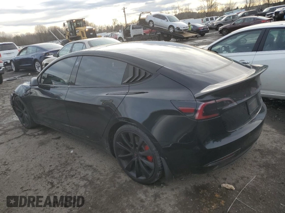 2019 Tesla Model 3 Long Range with VIN 5YJ3E1EB9KF440365, listed as a Copart auction lot 83839034 with 74,667 mi miles and Salvage Title. Bid and sale history available at DreamBid. Image 2.