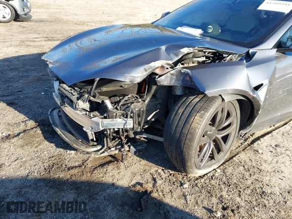 2022 Tesla Model S with VIN 5YJSA1E54NF488443, listed as a IAAI auction lot 41289281 with Not Provided miles and . Bid and sale history available at DreamBid. Image 6.