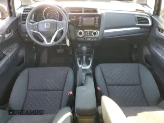 2016 Honda Fit LX with VIN 3HGGK5H56GM704864, listed as a Copart auction lot 75690264 with 54,543 mi miles and Salvage title. Bid and sale history available at DreamBid. Image 8.
