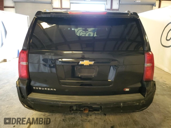 2018 Chevrolet Suburban LS z VIN 1GNSCGKC0JR278370, wystawiony jako Copart lot #57657395 z przebiegiem 224 903 mil mil oraz Czysty tytuł • Clean title. Historia ofert i sprzedaży dostępna na DreamBid. Obrazek 6.