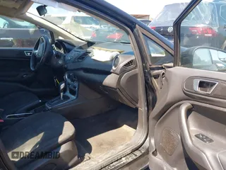 2016 Ford Fiesta SE with VIN 3FADP4BJ9GM144119, listed as a IAAI auction lot 41882179 with 122,048 mi miles. Bid and sale history available at carsss.com. Image 5.