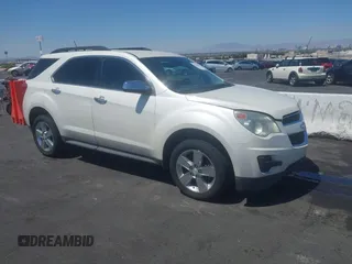 2014 Chevrolet Equinox LT z VIN 1GNALBEK2EZ110334, wystawiony jako IAAI lot #42320385 z przebiegiem 165 981 mil mil oraz . Historia ofert i sprzedaży dostępna na DreamBid. Obrazek 1.