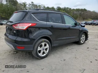 2016 Ford Escape SE with VIN 1FMCU9GX5GUB02417, listed as a Copart auction lot 51762985 with 97,535 mi miles and Salvage Title. Bid and sale history available at DreamBid. Image 3.