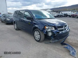 2016 Dodge Grand Caravan SE with VIN 2C4RDGBG4GR146450, listed as a IAAI auction lot 42015145 with 128,725 mi miles. Bid and sale history available at carsss.com. Image 1.