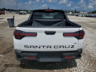 2022 Hyundai Santa Cruz SEL z VIN 5NTJB4AE7NH005711, wystawiony jako Copart lot #50662245 z przebiegiem 32 354 mil mil oraz Nie do naprawy • Non repairable. Historia ofert i sprzedaży dostępna na DreamBid. Obrazek 6.