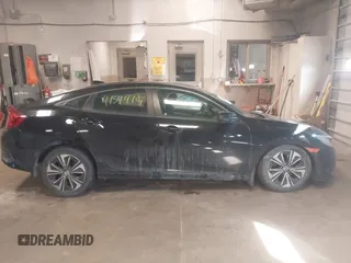 2017 Honda Civic EX-T with VIN 19XFC1E36HE020833, listed as a IAAI auction lot 41544107 with 95,425 mi miles and . Bid and sale history available at DreamBid. Image 13.