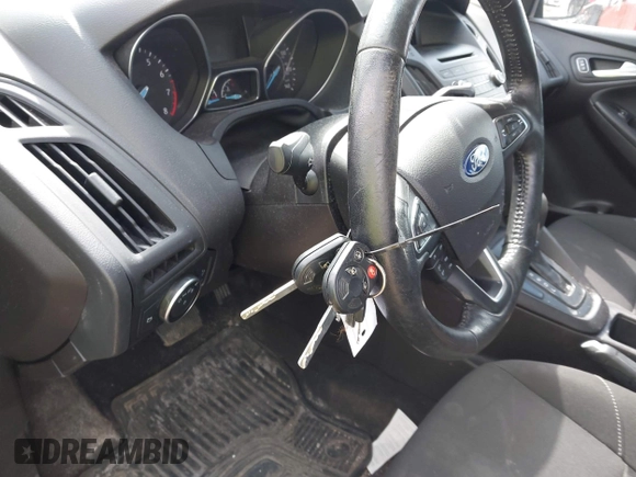 2017 Ford Focus SE with VIN 1FADP3F2XHL263071, listed as a IAAI auction lot 42046106 with 91,633 mi miles and . Bid and sale history available at DreamBid. Image 11.