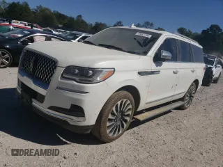 2022 Lincoln Navigator Black Label z VIN 5LMJJ2TT4NEL09900, wystawiony jako Copart lot #74687794 z przebiegiem Nie podano mil oraz Szkoda całkowita • Salvage title. Historia ofert i sprzedaży dostępna na DreamBid. Obrazek 1.