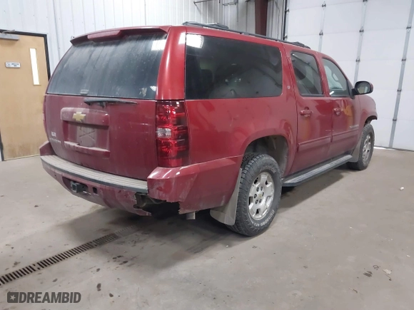 2013 Chevrolet Suburban LT with VIN 1GNSKJE76DR222890, listed as a IAAI auction lot 41698835 with 288,835 mi miles. Bid and sale history available at carsss.com. Image 4.