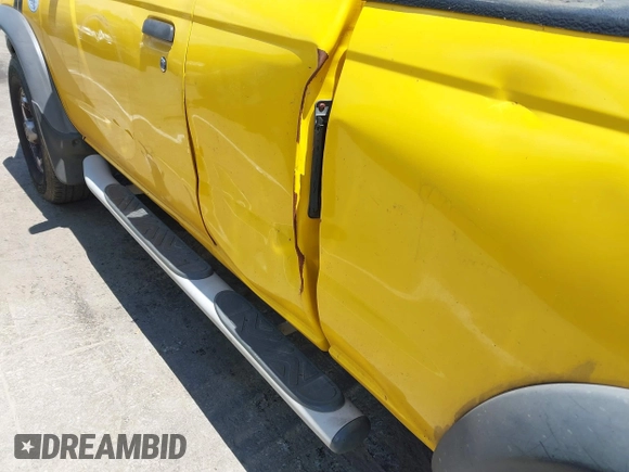 2000 Nissan Frontier XE with VIN 1N6ED26T7YC360056, listed as a IAAI auction lot 42354804 with Not provided miles and . Bid and sale history available at DreamBid. Image 6.