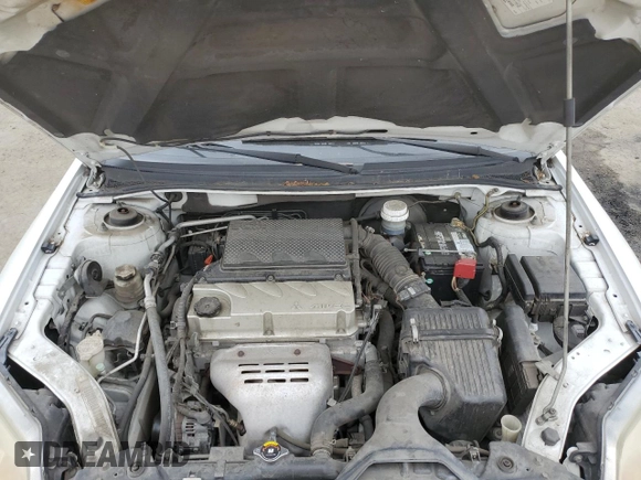 2012 Mitsubishi Galant FE z VIN 4A32B2FF8CE023718, wystawiony jako Copart lot #53543365 z przebiegiem 122 667 mil mil oraz Szkoda całkowita • Salvage title. Historia ofert i sprzedaży dostępna na DreamBid. Obrazek 13.