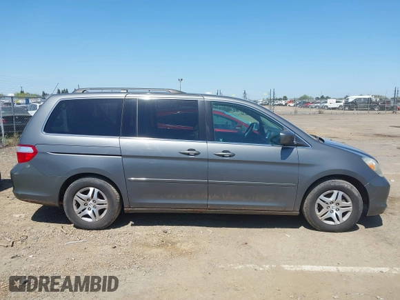 2007 Honda Odyssey EX-L z VIN 5FNRL38797B137595, wystawiony jako IAAI lot #42002233 z przebiegiem 192 296 mil mil oraz . Historia ofert i sprzedaży dostępna na DreamBid. Obrazek 13.