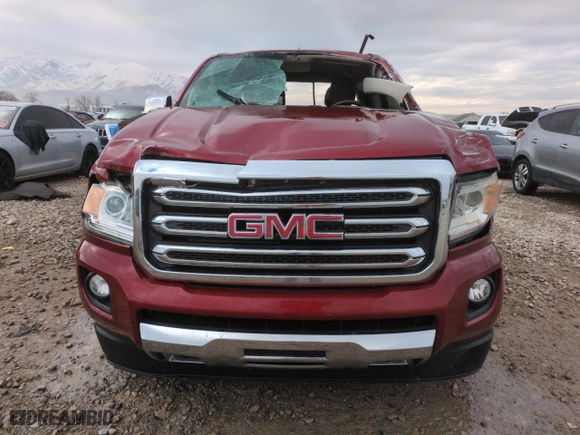 2017 GMC Canyon 4WD SLT with VIN 1GTG6DEN8H1292544, listed as a Copart auction lot 89187055 with 64,886 mi miles and Salvage Title. Bid and sale history available at carsss.com. Image 5.